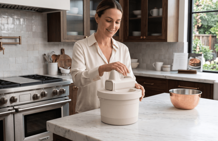 Woman using a Bella Hand and Stand Mixer made with AI.