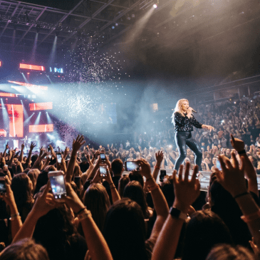 Concert image of someone who looks like Hilary Duff made with AI