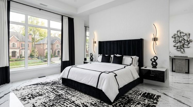 Black and white bedroom with wall sconces made with AI.